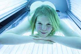 Naked Woman Relaxing On Tanning Bed In Solarium Stock Photo, Picture and  Royalty Free Image. Image 26239849.