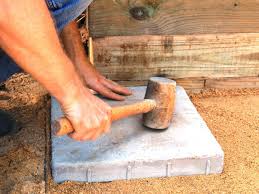 When all of the gaps are filled, gently sweep away excess paver locking sand. Building A Paver Patio How Tos Diy