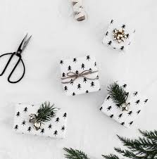 Simply center the christmas candy bar wrapper around the candy bar then gently fold the paper around the edges of the chocolate bar. Printable Christmas Wrapping Paper Homey Oh My