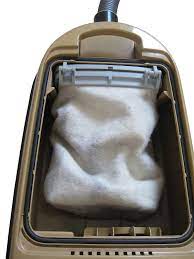 Follow the manufacturer's removal instructions, taking care to pinch tight the top so that no dust can escape. File Vacuum Cleaner Bag In Vacuum Cleaner Jpg Wikimedia Commons