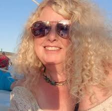 In search of a quilter who has their own long quilt machine that would be  willing to help me finish a homemade quilt I started.