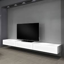 Depending on what you want to display, you can go for one or the other. White Tv Cabinets Floating Tv Stand Tv Stand Entertainment Center