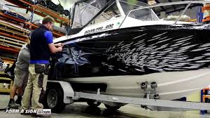 We do wraps as well as regular vinyl graphics, have been since 1994. Form A Sign Boats Boat Wrap