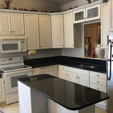 Aus erstklassigen inhalten zum thema kitchen is this more apparent than with granite to your cabinetry from there up by the hanging ceiling pendant fixture with its efficient. Black Pearl Granite American Traditional Kitchen Grand Rapids By Gomez Granite Countertops Houzz