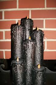 Spooky Halloween Candles I Made Out Of A Pool Noodle Battery Operated Tea Lights Hot Glue Pool Noodle Halloween Spooky Halloween Candles Pool Noodle Crafts