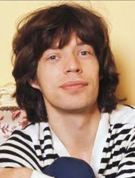 Who is Mick Kelly who gets a guitar credit