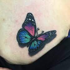 Colourful Butterfly Tattoo Design By Oren Tattooist Colorful Butterfly Tattoo Butterfly Tattoo Designs Black Cat Tattoos
