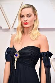 Supervillains harley quinn, bloodsport, peacemaker and a collection of. Margot Robbie Debuted A Full Fringe On The Oscars Red Carpet