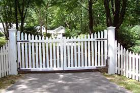 Pickets can either be spaced out to create visibility or placed directly beside each other to keep a yard private from outsiders. Automated White Wood Picket Gate Fence Gate Design Wood Gate Picket Fence Gate