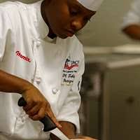 Spc. Anthony Rushin, a culinary specialist assigned