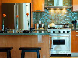 Add a vivid, colorful pot and vibrant fruit such as oranges and bananas, and this space designed by celerie colorful cabinets in a modern kitchen. Painting Kitchen Tiles Pictures Ideas Tips From Hgtv Hgtv