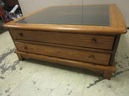 38 x 36 1/2 x 16 1/4 tall. Aa Laun Furniture Oak Coffee Table With Glass Top Display Drawer Lower Drawer Modern Industrial Style Furnishings Home Goods Dining Sets Accent Chairs Much More K Bid