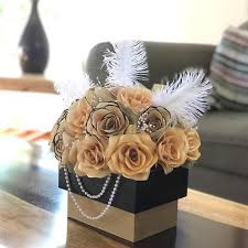 Black And Gold Flowers Arrangements This Shimmering Paper Flower Arrangement Gives A Great Gatsby Roaring 20s Feel Very Black And Gold Centerpieces Paper Flower Centerpieces Floral Arrangements