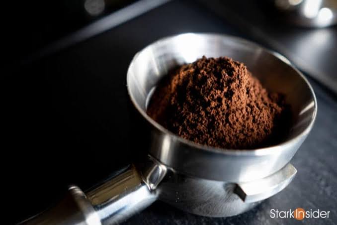 Fluffy, clump-free espresso grounds ready for tamping, AI generated