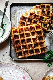 Potato pancakes are delicious, but you can make potato waffle sandwiches, put fried eggs and all manner of sauces on top of the potato waffle, make fried chicken and potato waffles, potato waffle burgers. Savory Mashed Potato Waffles Crowded Kitchen