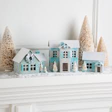 Learn how to make papier mache with materials you probably already have at home! Holiday Paper Mache Houses Fun365
