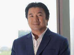 FirstMetroSec sees mobile opening for Converge's Dennis Uy, who once eyed  3rd telco slot