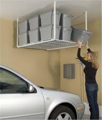 White ceiling storage unit provides organization for your garage. Ceiling Mounted Overhead Garage Storage Rack By Hyloft 00540 California Car Cover Company