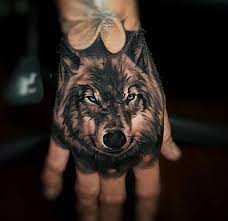 Wolf Hand Tattoo Hand Tattoos For Guys Wolf Tattoo Sleeve Wolf Tattoos