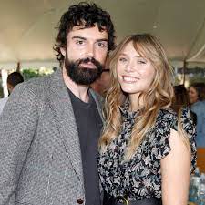 Elizabeth olsen has revealed she has married her partner robbie arnett after she called him her 'husband' during a wandavision interview on tuesday. 2rql0agypp7lam