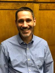 We are excited to announce that Ryan Baker-Fones will be serving as our lay  chaplain during the upcoming transition with Doug's departure. Ryan has  served as board chair for the past seven