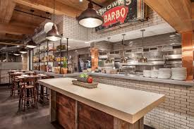 Restaurant Kitchen And Dining Room With Subway Tiles And Wood Ceiling Restaurant Tiles Restaurant Kitchen Design Restaurant Interior