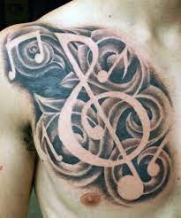 Strange and cool music tattoos for guys and girls for behind your ear, on your wrist or arm and on hand. Top 83 Music Tattoo Ideas 2021 Inspiration Guide