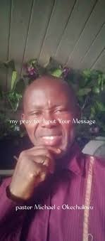 Felicia is being used by God in Uganda. Here she is giving bread to some  street kids and showing these girls themselves in the picture she took  (they rarely see themselves in