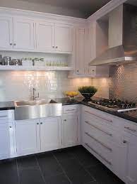 Stylish mosaic black tiles to contrast with white walls. Thoughts On Home Grey Kitchen Floor Kitchen Flooring Kitchen Renovation