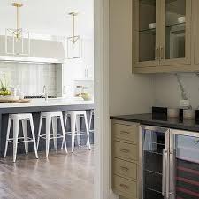 Browse below to find the precise cabinet style and finish that matches your vision. Taupe Cabinets With Black Granite Countertops Design Ideas