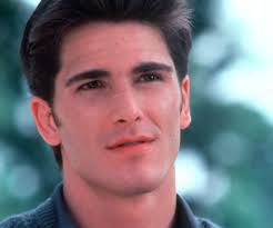 What did Jake's dad do when he got home and saw the party damage in the  movie 16 Candles?