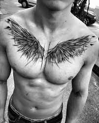 Modele de tatuaje permanente in poze si imagini sugestive. Tattoos Wing Tattoo Men Chest Tattoo Wings Wing Tattoo Designs