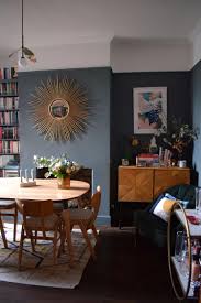Light and dark blue dining rooms have become popular in today's designer market. Eclectic Modern Bohemian Interior Styling Art Deco Cocktail Room Vintage Dark Blue Dining Room Scandinavian Elements 4 Design Soda Interiors Blog Colour Pattern Patina