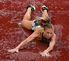 Genevieve gregson of team australia is taken off in a wheelchair after failing to finish the women's 3000m steeplechase final. 7chvizpnkegzxm