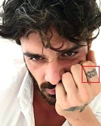 This tattoo 'cloud' is the name of michele's pet dog. Massimo Hand Tattoo Memento Mori Tattoo Wrist Tattoo Design The Bibical Meaning For Jews And Christians Is The Hand Of Miriam The Felisa Fulghum