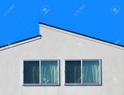 Take 90 seconds to find out! Modern Slope Style Design Roof House Wall With Clear Blue Sky Stock Photo Picture And Royalty Free Image Image 124737827