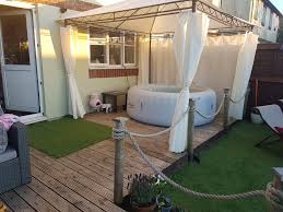 Simon Dartmouth It Takes Just Three Steps For Simon To Exit Is House And Enter His Very Own Place Of Rel Hot Tub Surround Hot Tub Gazebo Inflatable Hot Tubs