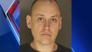 Man facing charges after throwing butcher knives at his girlfriend