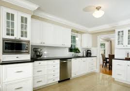 Our trim and molding selections are milled from solid hardwood and are factory finished to match your cabinet paint color. What Is A Kitchen Soffit And Can I Remove It Luxury Home Remodeling Sebring Design Build