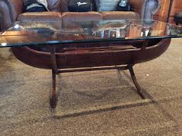 An authentic 5′ cedar canoe has been converted into a beautiful table with a full glass top and cherry. Bob Timberlake Canoe Coffee Table Antique Appraisal Instappraisal