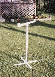The tank sits under the table of 6 pvc growing tubes, and the pump sits inside the tank to push nutrients up to the plants via a manifold of smaller pvc pipes and plastic tubes. Diy Pvc Garden Sprinkler Home Desaign