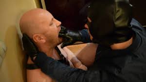 tough skinhead with wild passion fists me deep in the throat in leather  gloves