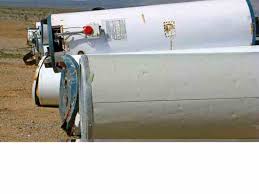 Having made many rocket stoves from concrete and metal, i wanted to try a new material. Build A Recycled Water Heater Wood Stove Diy Mother Earth News