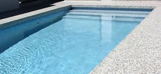 Image Result For Exposed Aggregate Concrete Around Pool White Outdoor Pool Area Swimming Pools Backyard Pool Paving