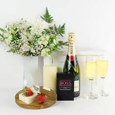 A sparkling champagne gift delivery. Champagne Flowers Simple Surprise Flowers Champagne Gift New York Blooms