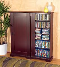 Let your dvd storage cabinet dry completely before it is taken indoors and placed in its location. Gettington Media Storage Cabinet With Sliding Doors
