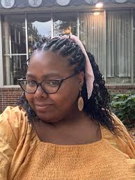 I talked about getting my hair braided for the first time in twenty years  yesterday- here's the ADORABLE result!