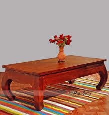 Choose from a variety of wood and metal finishes to complement any decor. Opium Coffee Table In Sheesham Wood Center Table With Curvy Legs Modern Stylish Carving Center Table India Online Coffee Tables With Opium Legs
