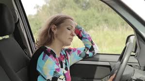 Image result for woman on cell with her car