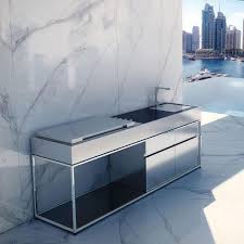 This stunning example of luxury combined with comfort while bringing the outdoors in is perfected by keeping the colors simple and understated. Cocoa Island Luxury Outdoor Kitchen Fesfoc Modern Stainless Steel Bbq Outdoor Kitchen Island Luxury Outdoor Kitchen Modern Outdoor Kitchen